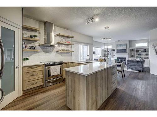 24 Royal Highland Court Nw, Calgary, AB - Indoor Photo Showing Kitchen With Upgraded Kitchen