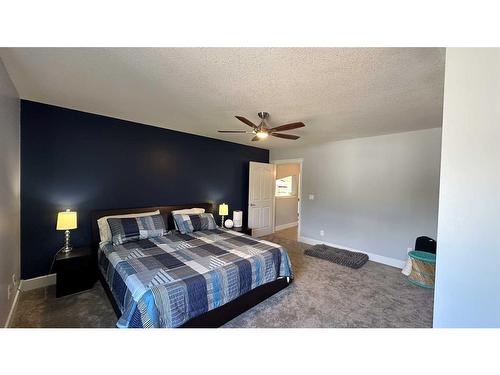 1304 2Nd Street, Sundre, AB - Indoor Photo Showing Bedroom