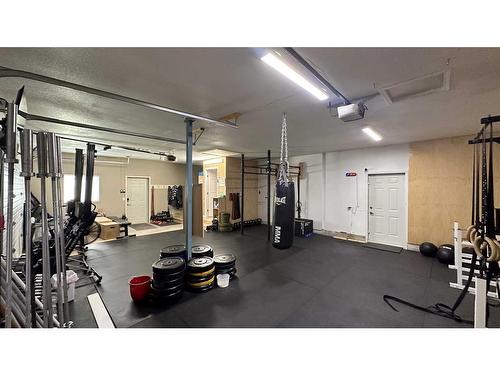 1304 2Nd Street, Sundre, AB - Indoor Photo Showing Gym Room