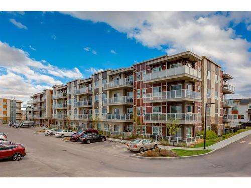 312-300 Harvest Hills Place Ne, Calgary, AB - Outdoor With Balcony With Facade