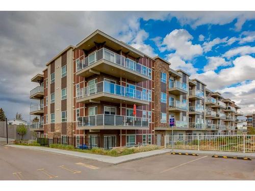 312-300 Harvest Hills Place Ne, Calgary, AB - Outdoor With Balcony With Facade
