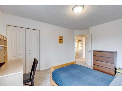 25 Cranston Drive Se, Calgary, AB - Indoor Photo Showing Bedroom