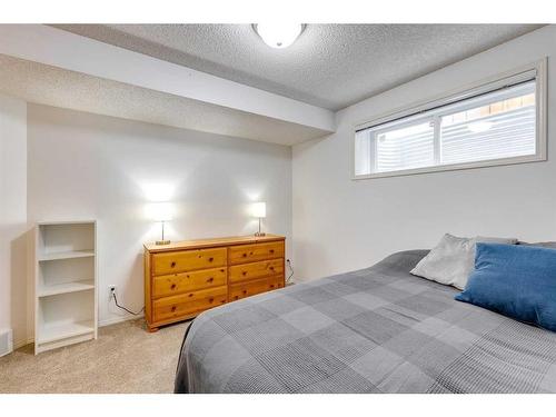 25 Cranston Drive Se, Calgary, AB - Indoor Photo Showing Bedroom