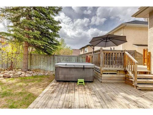 25 Cranston Drive Se, Calgary, AB - Outdoor With Above Ground Pool With Deck Patio Veranda With Exterior