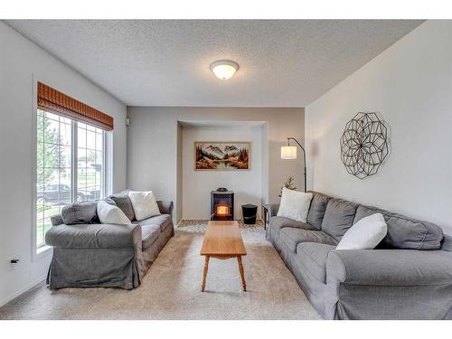 25 Cranston Drive Se, Calgary, AB - Indoor Photo Showing Living Room