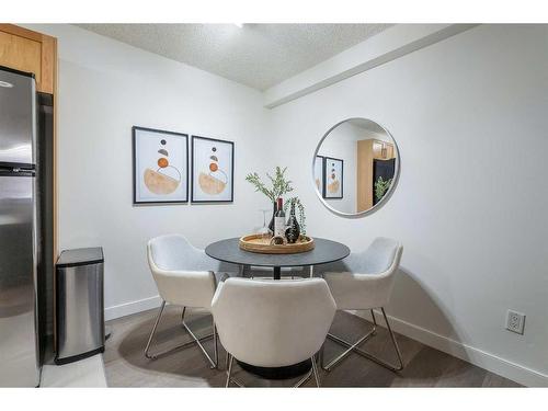 103-620 15 Avenue Sw, Calgary, AB - Indoor Photo Showing Dining Room