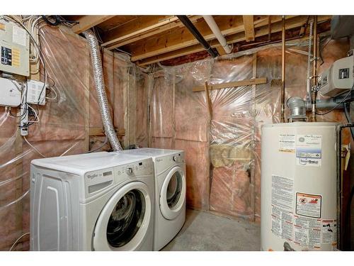 15 Shawglen Place Sw, Calgary, AB - Indoor Photo Showing Laundry Room