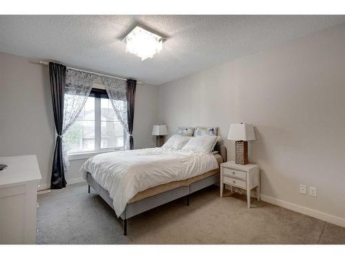 38 Nolanfield Road Nw, Calgary, AB - Indoor Photo Showing Bedroom