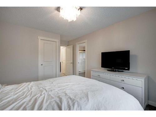 38 Nolanfield Road Nw, Calgary, AB - Indoor Photo Showing Bedroom