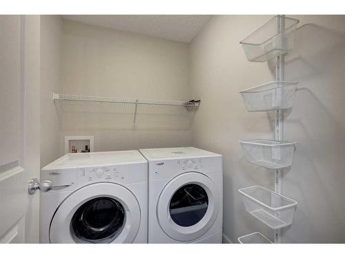 38 Nolanfield Road Nw, Calgary, AB - Indoor Photo Showing Laundry Room