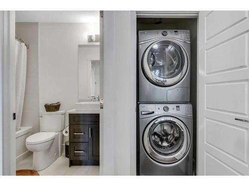 105-3320 3 Avenue Nw, Calgary, AB - Indoor Photo Showing Laundry Room