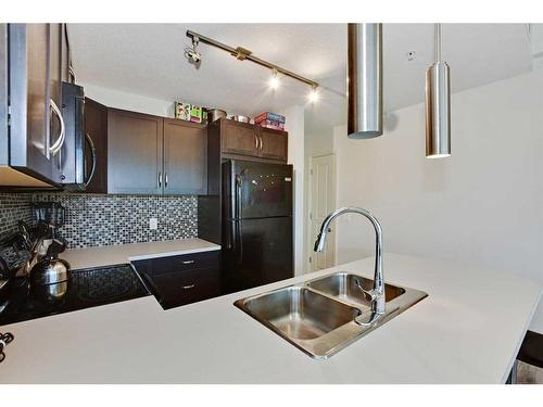 1102-1320 1 Street Se, Calgary, AB - Indoor Photo Showing Kitchen With Double Sink