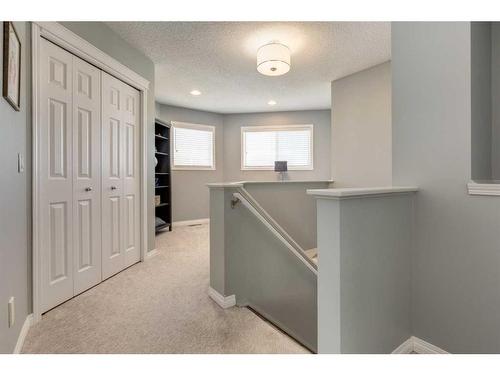 106 Cougar Plateau Way Sw, Calgary, AB - Indoor Photo Showing Other Room