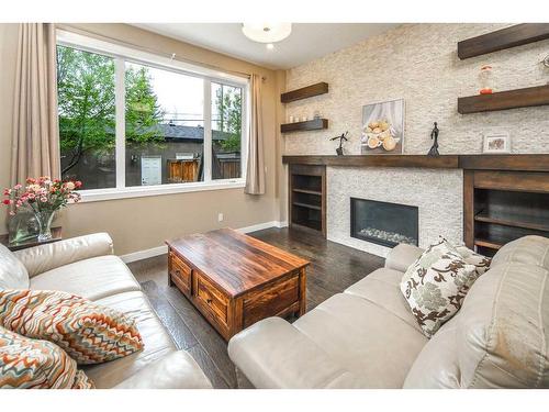 2817 23A Street Nw, Calgary, AB - Indoor Photo Showing Living Room With Fireplace