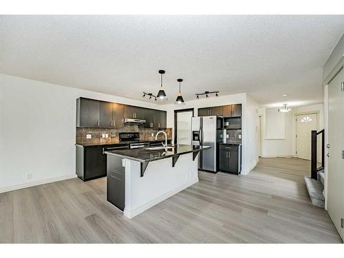 20 Auburn Bay Lane Se, Calgary, AB - Indoor Photo Showing Kitchen With Stainless Steel Kitchen