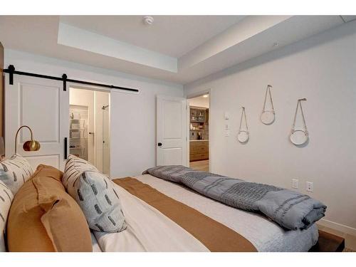 4105-550 Belmont Street Sw, Calgary, AB - Indoor Photo Showing Bedroom