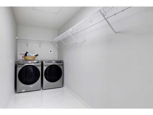 4105-550 Belmont Street Sw, Calgary, AB - Indoor Photo Showing Laundry Room