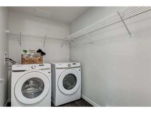 2108-33 Carringham Gate Nw, Calgary, AB - Indoor Photo Showing Laundry Room