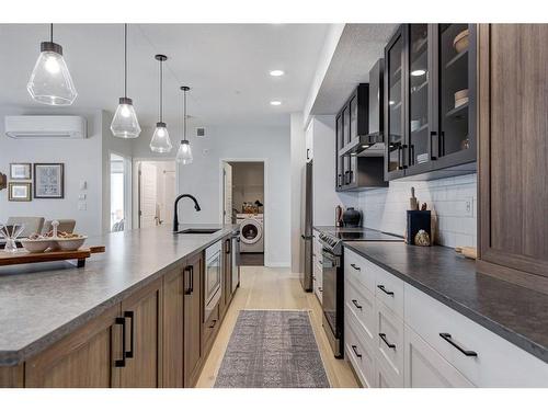 2108-33 Carringham Gate Nw, Calgary, AB - Indoor Photo Showing Kitchen With Upgraded Kitchen