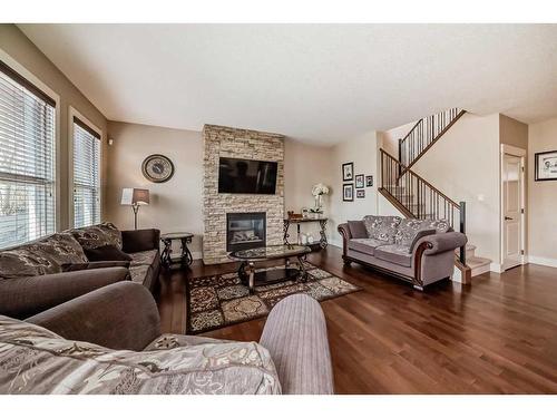 54 Auburn Glen Manor Se, Calgary, AB - Indoor Photo Showing Living Room With Fireplace