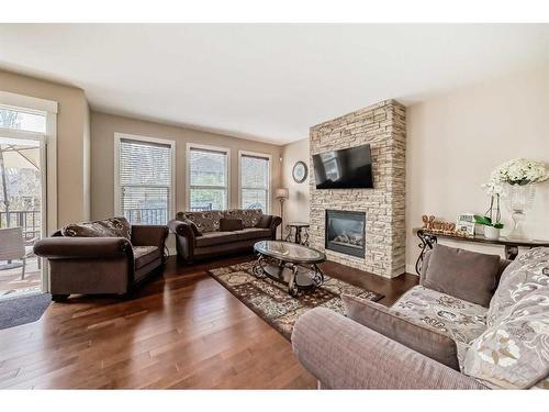 54 Auburn Glen Manor Se, Calgary, AB - Indoor Photo Showing Living Room With Fireplace