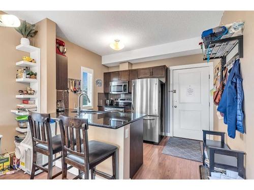 301-3950 46 Avenue Nw, Calgary, AB - Indoor Photo Showing Kitchen With Stainless Steel Kitchen