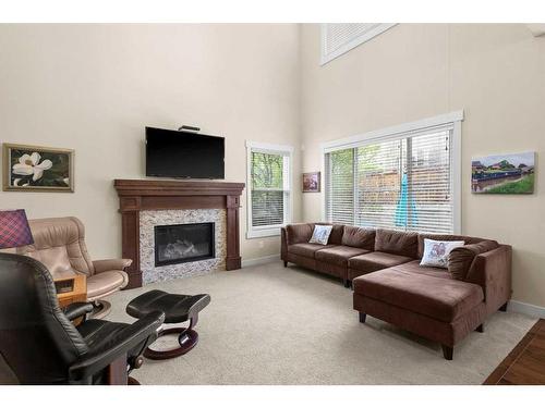 10 Sage Valley Mews Nw, Calgary, AB - Indoor Photo Showing Living Room With Fireplace