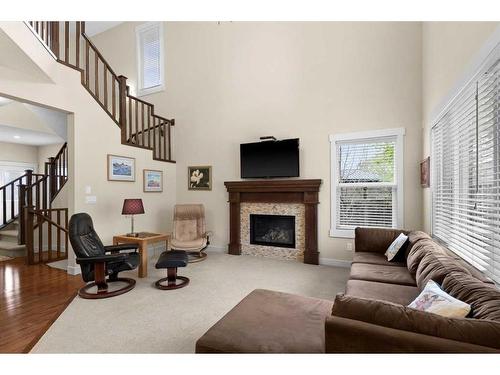 10 Sage Valley Mews Nw, Calgary, AB - Indoor Photo Showing Living Room With Fireplace