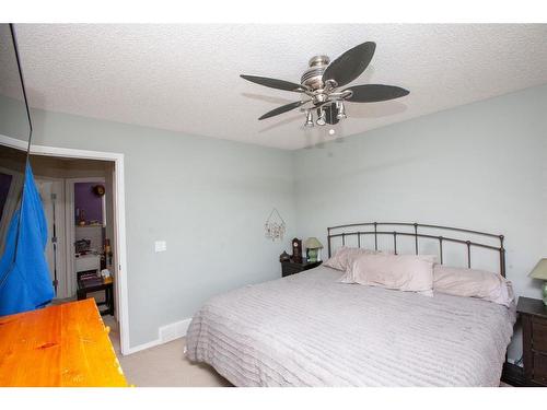 1747 High Country Drive Nw, High River, AB - Indoor Photo Showing Bedroom