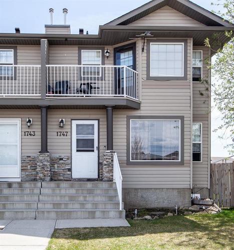 1747 High Country Drive Nw, High River, AB - Outdoor With Facade
