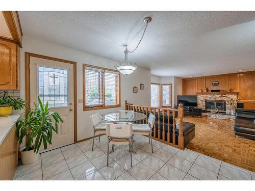 20 Edelweiss Drive Nw, Calgary, AB - Indoor With Fireplace