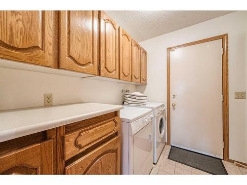 20 Edelweiss Drive Nw, Calgary, AB - Indoor Photo Showing Laundry Room