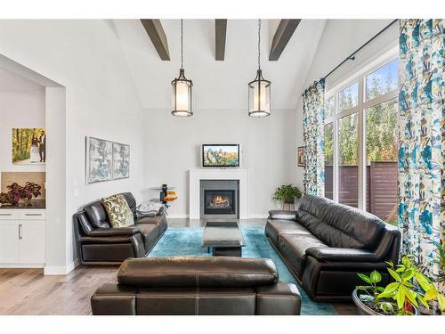 223 Mahogany Landing Se, Calgary, AB - Indoor Photo Showing Living Room With Fireplace