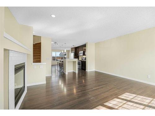 206 Cranford Park Se, Calgary, AB - Indoor With Fireplace