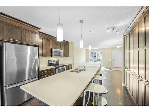 206 Cranford Park Se, Calgary, AB - Indoor Photo Showing Kitchen With Double Sink With Upgraded Kitchen