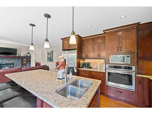 16159 Mckenzie Lake Way Se, Calgary, AB - Indoor Photo Showing Kitchen With Double Sink With Upgraded Kitchen