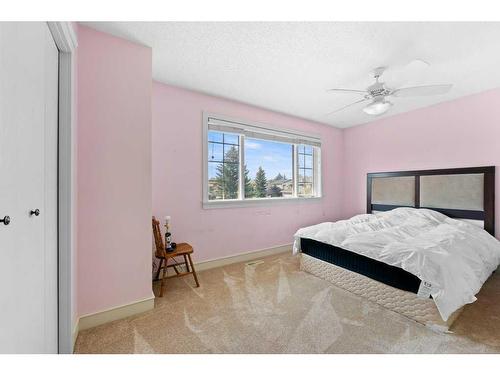 16159 Mckenzie Lake Way Se, Calgary, AB - Indoor Photo Showing Bedroom