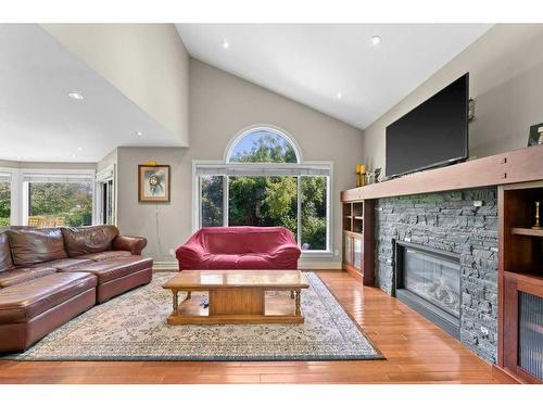 16159 Mckenzie Lake Way Se, Calgary, AB - Indoor Photo Showing Living Room With Fireplace
