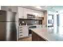 407-550 Riverfront Avenue Se, Calgary, AB  - Indoor Photo Showing Kitchen With Upgraded Kitchen 
