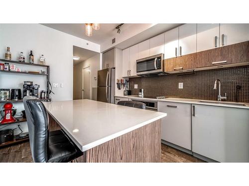 407-550 Riverfront Avenue Se, Calgary, AB - Indoor Photo Showing Kitchen With Upgraded Kitchen