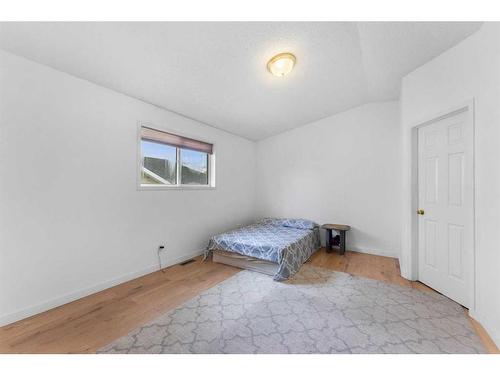 249 Hawkstone Drive Nw, Calgary, AB - Indoor Photo Showing Bedroom