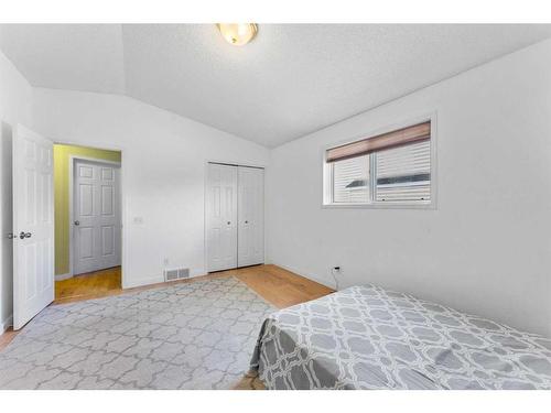 249 Hawkstone Drive Nw, Calgary, AB - Indoor Photo Showing Bedroom