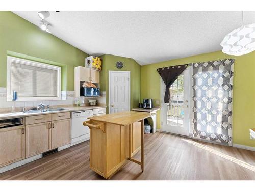 249 Hawkstone Drive Nw, Calgary, AB - Indoor Photo Showing Kitchen With Double Sink