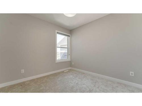 198 Carringsby Way Nw, Calgary, AB - Indoor Photo Showing Other Room