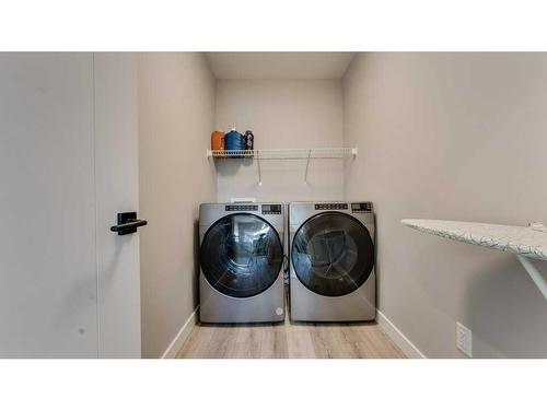 198 Carringsby Way Nw, Calgary, AB - Indoor Photo Showing Laundry Room