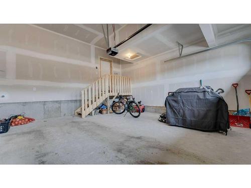198 Carringsby Way Nw, Calgary, AB - Indoor Photo Showing Garage