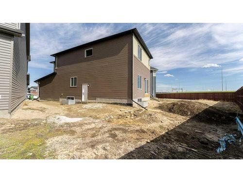 198 Carringsby Way Nw, Calgary, AB - Outdoor With Exterior