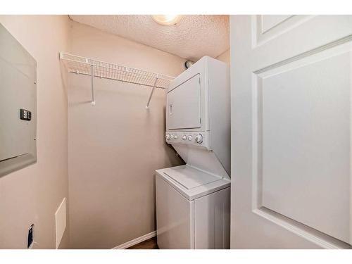 1306-5 Country Village Park Ne, Calgary, AB - Indoor Photo Showing Laundry Room
