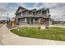 245 Bayside Loop Sw, Airdrie, AB  - Outdoor With Facade 