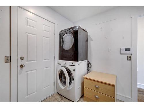 117 Rocky Ridge Cove Nw, Calgary, AB - Indoor Photo Showing Laundry Room